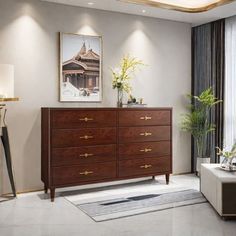 a living room with a large wooden dresser next to a window