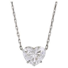 This heart-shaped diamond pendant necklace is a true masterpiece of fine jewelry, featuring an exceptional 11.14-carat diamond graded as I color and VS2 clarity by the Gemological Institute of America (GIA). Crafted from sleek and durable platinum, the necklace's 13.07-gram chain creates a modern look while ensuring the diamond remains secure. Created by Spectra Fine Jewelry, this exquisite pendant necklace is perfect for special occasions or everyday wear and will surely become a treasured part of your jewelry collection. Experience the ultimate luxury and sophistication with this magnificent heart-shaped diamond pendant necklace. GIA certified hear-shaped diamond weighing 11.04 carats, I color, VS2 clarity. Platinum chain, adjustable length 15-17 inches (38-43 cm), weight 13.07 grams. Ma Elegant Heart Shaped Diamond Necklace With Vvs Clarity, Vvs Clarity Open Heart Diamond Necklace, Fine Jewelry Heart Pendant With Vvs Clarity, Heart-shaped Brilliant Cut Diamond Necklace Gift, Heart-shaped Diamond Necklaces With Polished Finish, Heart Shaped Diamond Necklace, Heart Shaped Diamond Pendant, Platinum Chain, Beautiful Accessories