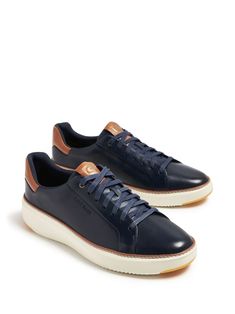 Find COLE HAAN Grandprø Topspin Sneakers on Editorialist. navy blue calf leather brushed finish front lace-up fastening logo patch at the tongue contrasting heel counter debossed logo to the side round toe flat rubber sole Sporty Navy Sneakers With Stitched Sole, Blue High-top Sneakers With Stitched Sole, Navy Casual Sneakers With Stitched Sole, Blue Sneakers With Rubber Heel Cap, Navy Casual Sneakers With Leather Sole, Sporty Navy Sneakers With Leather Sole, Classic Navy Sneakers With Contrast Sole, Navy Sneakers With Leather Sole And Round Toe, Classic Blue Sneakers With Perforated Toe Box