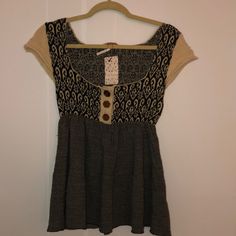 Nwt Free People Knit Top Size Medium Buttons In Front Casual Jacquard Knit Top For Spring, Fitted Beige Jacquard Knit Top, Casual Jacquard Knit Top For Fall, Beige Jacquard Knit Top, Bohemian Soft Knit Tops For Fall, Black Jacquard Knit Tops For Fall, Casual Jacquard Knit Top, Black Short Sleeve Knit Top For Fall, Black Jacquard Knit Top For Spring