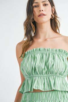 Stripe ruched tube top. Runs true to size. Model is wearing a small (32” bust, 26” waist, 35” hips, 5’2”) Bust Waist Length Small 34 inches 34 inches 10 inches Medium 36 inches 36 inches 10 inches Large 38 inches 38 inches 11 inches We measure each item from side seam to side seam, on a flat surface. Please consider the fabric content of each item, as fabric containing stretch may have give. Ring Bag, Waist Length, Flat Surface, 11 Inches, Tube Top, Jewelry Sales, Clothes For Sale, Jumpsuit Dress, Accessories Hats