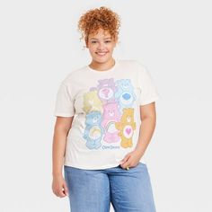 Step out in style with the Women's Care Bears Short Sleeve Graphic T-Shirt - Off-White. Made from soft material with a crew neck and short sleeves, this t-shirt keeps you cool and relaxed. It has a colorful Care Bears graphic print to add a fun touch. Express your unique style with the Women's Care Bears Short Sleeve Graphic T-Shirt - Off-White. White Short Sleeve T-shirt With Funny Print, Cute White Short Sleeve T-shirt, Cute Multicolor Relaxed Fit T-shirt, Casual Multicolor T-shirt With Funny Print, Casual Short Sleeve T-shirt With Funny Print, Trendy White Crew Neck T-shirt, White Short Sleeve Casual T-shirt, White Casual Short Sleeve T-shirt, Trendy White Short Sleeve T-shirt