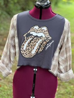 This very unique Rolling Stones shirt has been cropped at waist length with flannel sleeves added. Awesome neutral colors, great for fall! Grunge Cropped Tops For Fall, Punk Style Festival Tops For Fall, Fall Flannel Top With Graphic Print, Rock Style Cotton Top For Fall, Upcycled Long Sleeve Tops For Fall, Casual Flannel Patchwork Tops For Fall, Reworked Cotton Tops For Fall, Upcycle Patterns, Boho Rocker Chic Style