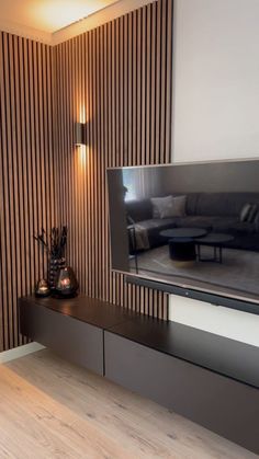 Backlit Panels Add LED lighting behind the panels for a warm, ambient glow. Works well for evening settings in the living room. Hashtags Use these hashtags to increase the reach of your content: #WallWoodPaneling #WoodPanelingIdeas #LivingRoomDecor #PlywoodDesigns #InteriorInspiration #WoodenWalls #ModernLivingRoom #RusticDecor #HomeDesignIdeas #WallPaneling #DIYDecorIdeas #CustomWoodwork #AccentWallDesign Panelling Living Room, Living Room Wall Panelling, Plywood Ideas, Walnut Tv Cabinet, Panelling Design, Slat Walls, Accent Wall Design, Soft Autumn Color Palette