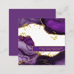 the purple and gold marble business card is displayed on a white surface with an elegant, modern