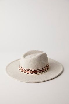 Forever cool and classic, this forever essential hat is featured in a staple wide-brim style and soft felt fabrication with defined band at center for an added special, western-inspired touch. **Features:** Classic wide brim style, dipped crown, defined band at center **Why We ❤ It:** Sure to be a staple in your accessories collection for countless years to come, this so timeless hat is just as versatile as it is vintage-inspired. | Kimi Rancher Hat by Free People in Grey Western Style Wide Brim Felt Hat For Fall, Western Wide Brim Fedora For Fall, Wide Brim Felt Hat For Rodeo In Fall, Flat Crown Fedora For Western-themed Fall Events, Beige Felt Hat For Fall Country Events, Wide Brim Felt Hat For Ranch In Fall, Beige Felt Hat For Rodeo In Fall, Country Style Fedora Felt Hat For Fall, Country Style Fedora With Flat Brim For Fall