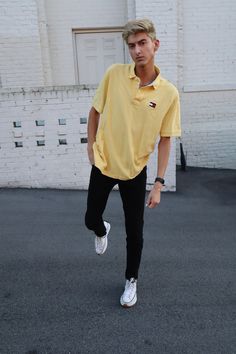 XL, vintage, yellow, large-logo Tommy Hilfiger polo. The shirt is in great condition with no tears or stains. Model is 6ft. Sporty Yellow Polo Shirt With Short Sleeves, Yellow Cotton Polo Shirt With Polo Collar, Sporty Yellow Short Sleeve Polo Shirt, Yellow Sporty Cotton Polo Shirt, Yellow Cotton Sporty Polo Shirt, Casual Yellow Polo Shirt, Casual Yellow Cotton Polo Shirt, Tommy Hilfiger Polo, Vintage Tommy Hilfiger