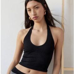 Never Worn Without Tags. Purchased At Urban Outfitters. Black Cropped Halter Top With Built-in Bra, Black Halter Neck Top With Built-in Bra, Black Halter Neck Crop Top With Built-in Bra, Black Halter Top With Built-in Bra For Spring, Black Tank Crop Top With Seamless Construction, Black Seamless Tank Crop Top, Black Fitted Racerback Halter Top, Black Stretch Halter Top With Built-in Bra, Black Stretch Halter Neck Top