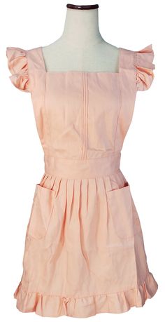 a pink dress on a mannequin neckline with ruffles and collar