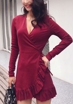 Flirty Wrap Dress For Date Night, Flirty Wrap Dress, Flirty Wrap Dress For Night Out, Fall Cocktail Wrap Dress With Surplice Neckline, Long Sleeve Faux Wrap Dress For Date Night, Chic Fitted Wrap Dress For Party, Elegant Faux Wrap Mini Dress For Party, Fitted Faux Wrap Dresses For Fall, Elegant Solid Color Wrap Dress For Party