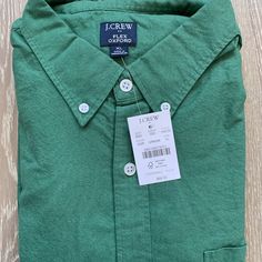 This Nice Shirt From J. Crew Factory Features A Button-Down Front, Collar, Slim Fit, And Chest Pocket. New With Tags Size Xl Msrp $59.50 Cotton Crew Neck Shirt With Button Closure, Green Cotton Tops With Casual Collar, Green Cotton Top With Casual Collar, Green Shirt With Placket For Workwear, Cotton Tops With Button Closure And Casual Collar, Classic Crew Neck Shirt For Work, Green Button-up Shirt With Button Cuffs, Green Shirt With Casual Collar And Buttons, Green Workwear Shirt With Button Closure