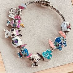 Stitch Bracelet, Includes 9 Charms In Silver Plated Material. Size 17cm And 21 Cm Stitch Bracelet, Disney Jewelry, Womens Jewelry Bracelets, Silver Plate, Silver Plated, Charms, Women Jewelry, Bracelet, Disney