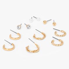 Expand your earring collection with this set of hoop and stud earrings in gold-tone and faux crystal and pearl styles. With six designs to choose from, you'll always have the perfect pair for any outfit. Pack Size: 6 Finish: Gold-tone Closure: Post back Material: Metal - Claire's Gold Textured Earrings Set - 6 Pack 6 Packs, Fashion Accessories Jewelry, Earrings Collection, Gold Texture, Gold Studs, Gold Earrings Studs, Girls Accessories, Trending Accessories, Diamond Studs