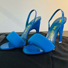 The Attico’s Rem Slingback Sandal Features A Puffy Toe Strap And Angled Heel In A Bright Pop Of Color! Brand: The Attico Style: Rem Slingback Sandal With An Elasticized Slingback Strap Material: Turquoise Textile And Leather Upper And Lining And Leather Sole Heel Height: 4” Condition: Nwt Accessories: These Will Be Shipped With The Original Dust Bags And Extra White Heel Taps That Came With The Shoes. I Purchased These At Neiman Marcus In Dallas, Tx. As Always, I Am Open To Offers But Will Not E Heel Taps, Bright Pop, Heel Tap, The Attico, White Heels, Slingback Sandal, Dallas Tx, Women's Shoes Sandals, High Heel