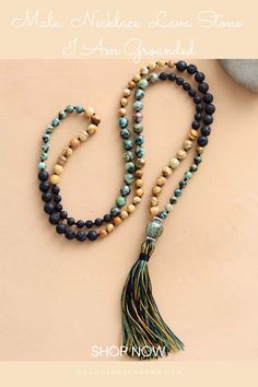 Mala Beads Necklace Lava Stone I Am Grounded. Gorgeous mala with picture, African turquoise jasper, and lava stone. Inspired by Autumn colors. Get inspired by the meaning of the mala beads and check out our mala necklace collection. Malas and meditation go hand in hand. They help you to enhance your spiritual practices. We offer a great variety of prayer beads, meditation tools, Japa mala 108 beads, and 27. Check our website to see more> Nature-inspired Agate Jewelry For Meditation, Nature-inspired Gemstone Beads Necklace For Meditation, Spiritual Green Crystal Necklaces For Festivals, Green Spiritual Crystal Necklaces For Festivals, Green Spiritual Crystal Necklace For Festival, Bohemian Hand Knotted Jewelry For Healing, Bohemian Hand-knotted Jewelry For Healing, Bohemian Hand Knotted Healing Jewelry, Earthy Green Jewelry With 8mm Beads