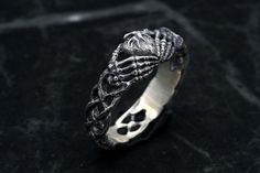 Gothic Engraved Rings For Gift, Unique Handmade Engraved Promise Ring, Unique Stainless Steel Promise Ring, Handmade Silver Engraved Ring For Promise, Handmade Silver Engraved Promise Ring, Unique Hand Cast Engraved Promise Ring, Symbolic Hand Cast Ring Jewelry, Symbolic Hallmarked Jewelry For Promise Ring, Gothic Style Jewelry Ring Gift