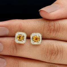 Product Details These Vintage Stud Earrings for Women are set in gold, it consists of Round Shape Citrine embellished in Prong Setting with Round Shape Diamond embellished in Pave Setting, for your happiness and shine. Product Information SKU SHP-EARRINGS042171390 Weight 1.76 gm (Approximate) CITRINE INFORMATION No.of Stones 2 Pieces Total Weight 1.02 Carat (Approximate) Dimension(approx) Round-5X5 mm-2 Pcs Color Yellow Cut Brilliant Shape Round Setting Type 4-Prong-Setting Quality Grade AAA DIA Vintage Stud Earrings, Citrine Earrings, Signature Jewelry, Stud Earrings For Women, Pave Setting, Diamond Stud Earrings, Timeless Jewelry, Type 4, Diamond Stud