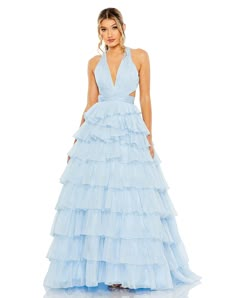 This bold prom dress is styled with a pleated bodice with a deep neckline, waist cutouts, and crisscross center. Layers of graduated ruffles fill out the full skirt for a design that’s festive and flirty.  Mac Duggal  Chiffon fabric (100% polyester) Fully lined through body Plunge neckline Sleeveless Pleated bodice Cri Bold Prom Dresses, Fuschia Evening Dress, Mac Duggal Prom, Prom Dress Plus Size, Layered Cut, Fall Wedding Guest Dress, Prom Long, Prom Ball Gown, Evening Dresses Cocktail