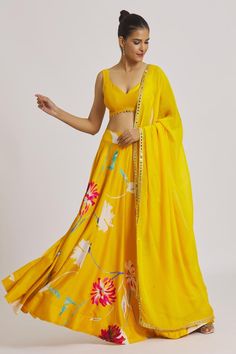 Mustard, yellow lehenga with floral prints and embroidery detailing. Paired with blouse and embroidered dupatta.
Components: 3
Pattern: Printed, Embroidered
Type Of Work: Floral
Neckline: V neck
Sleeve Type: Sleeveless
Fabric: Chanderi, organza, Lining: Shantoon
Color: Yellow
Other Details: 
Back deep neck detailing
Length:
Blouse: 14.5-15 inches
Lehenga: 43 inches
Occasion: Puja - Aza Fashions Designer Yellow Lehenga With Floral Embroidery, Yellow Choli With Floral Embroidery For Reception, Yellow Floral Embroidered Sharara For Reception, Yellow Floral Embroidery Sharara For Reception, Reception Yellow Floral Embroidered Sharara, Designer Yellow Choli With Floral Embroidery, Yellow Lehenga With Floral Embroidery For Festive Occasions, Yellow Floral Embroidered Lehenga For Wedding, Festive Yellow Lehenga With Floral Embroidery