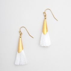 Brand New, Never Worn, With Tags! Getting Swept Away Tassel Earrings By Peter + June At Modcloth In Gold / White. Beautiful And Perfect Statement Earrings To Complete Any Outfit. Trendy, Boho Chic, And Lightweight. Pair With Anything From Your Favorite Sundress To The Everyday Tee And Jeans! Add Artistic Texture And A Majestic-Meets-Minimalist Touch To Any Look. ******* Pacsun Bdg Brandy Melville Asos Zara Mango Anthropologie Out From Under Madewell Free People Cotton On Kimchi Blue Truly Madly White Fringe Earrings For Summer, White Tassel Earrings With Latkans For Gift, White Tassel Earrings With Latkans As Gift, White Tassel Dangle Earrings, White Dangle Tassel Earrings As Gift, White Fringe Tassel Earrings For Summer, White Beaded Tassel Drop Earrings, White Latkans Earrings, Elegant White Summer Tassel Earrings