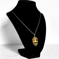 Tiger's Eye Pendant Necklace | Antique Silver or Gold | 24" Chain Wealth + Confidence + Motivation + Grounding Carry your intentions wherever you go with a handmade Tiger's Eye pendant necklace. Each pendant is custom made with an antique gold or silver filigree base and comes with an 24" chain with lobster clasp fastening. Tiger's Eye is a stone sacred to the Sekhmet, goddess of both war and healing. It is a stone of balance that gives us the courage to persevere and the grace to accept what we Sekhmet Goddess, Confidence Motivation, Attracting Wealth, The Poison, Eye Pendant Necklace, Pick Your Poison, Necklace Antique, Eye Pendant, Tiger's Eye