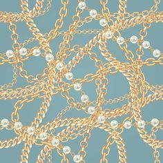 an image of a chain and pearls pattern on a blue background with gold trimmings