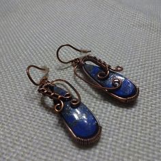 Rustic "Sodalite" Handmade Copper Wire-Wrapped Dangle Earrings (1 1/2" Drop) #505b All Of My Jewelry Is Handmade By Me In My Smoke & Pet Free Home!!!!!! Please Note That Every Item Purchased Comes In A Drawstring Organza Bag For Easy Gift Giving!!! Please Note That I Will Consider Any Reasonable Offer On My Jewelry!!!!!!!!!! Please Let Me Know If You Have Any Further Questions. Thanks For Stopping By And Have A Terrific Day!!!! Adjustable Blue Wrap Earrings For Gift, Blue Copper Wire Wrapped Earrings, Blue Adjustable Wrap Earrings With Ear Wire, Adjustable Blue Wrap Earrings, Blue Dangle Wrap Earrings As Gift, Blue Wire Wrapped Copper Earrings, Blue Copper Wire Earrings With Ear Wire, Hand Wrapped Blue Earrings Gift, Blue Hand Wrapped Earrings Gift