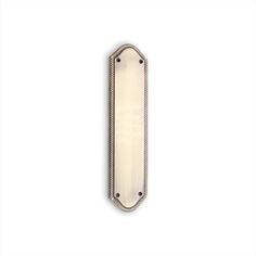 a white door handle with rope on it's sides and an oval design in the middle