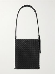 "When creating a Bottega Veneta bag, we count days, not hours, " says the brand. Artisans in Italy have handcrafted this messenger bag by meticulously weaving strips of leather in the signature intrecciato technique. It's roomy enough to carry your tablet, water bottle and a hard case for your sunglasses. Formal Rectangular Shoulder Bag With Woven Leather, Formal Rectangular Woven Leather Shoulder Bag, Designer Rectangular Shoulder Bag With Intrecciato Weave, Luxury Rectangular Shoulder Bag With Woven Leather, Luxury Rectangular Shoulder Bag In Woven Leather, Luxury Woven Leather Rectangular Shoulder Bag, Luxury Rectangular Woven Leather Shoulder Bag, Designer Square Bag With Woven Leather, Designer Square Bags With Woven Leather