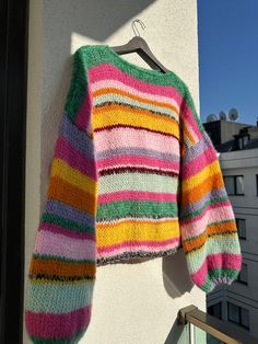 Colorful Stripes Sweater, Chunky Knit Sweater Colorful, Multi Colored Crochet Sweater, Scrappy Knit Sweater, Multicolor Knitted Cropped Sweater, Multicolor Knitted Long Sleeve Cropped Sweater, Multicolor Long Sleeve Knitted Cropped Sweater, Casual Multicolor Knitting Pattern For Fall, Multicolor Relaxed Fit Long Sleeve Sweater