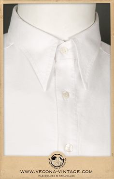 "Complete your Vecona Vintage outfit with our classic 1930s Oxford shirt. Spearpoint collar, half-placket, and gussets at the side seams are the most remarkable details of this 100% cotton shirt. It opens with a row of real mother-of-pearl buttons. The fine oxford shirting has a sophisticated texture that goes perfectly with tweed, gabardine and linen. Color white Material 100% cotton Size S: collar 37cm / 14.5\" Size M: collar 39cm / 15.5\" Size L: collar 41cm / 16\" Size XL: collar 43cm / 17\" Classic White Fitted Collars, Classic Shirt With Button Closure, Classic Dress Shirt With Fold Down Collar For Daywear, Classic Daywear Shirt, Classic Shirt With Placket For Daywear, Classic Unstructured Solid Shirt, Classic Shirt With Fold Down Collar For Daywear, Classic Unstructured Solid Color Shirt, Classic Shirt With Johnny Collar And Button Closure