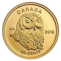 a gold coin with an owl on it's face and the words canada written in white