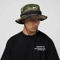 New Nike Dri-Fit Boonie Camo Bucket Hat Adult Unisex Bucket Camouflage Cotton Blend Polyester The Nike Boonie Bucket Hat Has You Covered With A 360-Degree Brim And A Drawcord That Cinches Down For A Stay-Put Fit When You're On The Move. Sweat-Wicking Power And Built-In Vents Team Up To Help Keep Your Head Dry And Cool. Camo Print Creates A Commanding Look. Product Details Smooth, Stretchy Durable Lightweight Fabric Dri-Fit Technology Wicks Away Unwanted Moisture Camo Printed Body Daisy Chain Tri Nike Outdoor Hats, Nike Black Hats For Outdoor, Summer Camouflage Bucket Hat, Casual Camouflage Bucket Hat For Summer, Black Military Summer Hat, Casual Nike Flat Brim Hat, Casual Camouflage Bucket Hat For Outdoor, Casual Camouflage Bucket Hat, Spring Outdoor Camouflage Hats