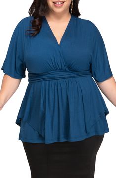 A tiered, drapey hem adds a dynamic flourish to this casual-chic stretch-knit blouse. Style Name:Kiyonna Promenade Top (Plus Size). Style Number: 5921029. Available in stores. Stretch Rayon V-neck Blouse, Flowy V-neck Viscose Blouse, Flattering V-neck Top For Spring, Flattering V-neck Spring Tops, Fitted Rayon V-neck Top, Flowy Solid Color Rayon Tops, Flowy Solid Rayon Tops, Solid Color Flowy Rayon Tops, Fitted Rayon Tops For Layering