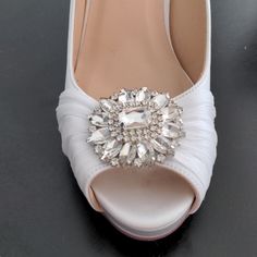 *White Satin Dyeable Peep-Toe Pumps *Gorgeous Crystal Detail *4.5 Inch Heel *Never Worn Elegant Wedding Shoe Clips For Summer, Glamorous White Shoe Clips For Wedding, White Glamorous Wedding Shoe Clips, Glamorous White Wedding Shoe Clips, Perfect Wedding Shoes, The Perfect Wedding, 5 Inch Heels, White Satin, Wedding Shoes