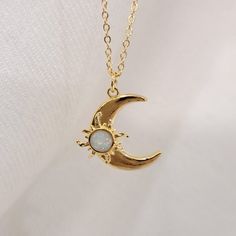 Gold Dainty Opal Crescent Moon Necklace, Moon and Sun Opal Charm Necklace, Celestial Necklace, Birthday Gift for Her. Gold Layering Necklace ♥ Each piece looks beautiful alone or great for layering.  ♥ I ensure a high-quality piece of jewelry you can wear for a long time (Please read care instructions below).    Made with high quality of Stainless steel, 18K gold filled and real 18K gold plated tarnish resistant, Hypoallergenic, lead and nickel free.    (This gold plated have 3x layers of solid Celestial Moon Necklace, White Celestial Moon Jewelry, White Moon Shaped Celestial Jewelry, White Moon-shaped Celestial Jewelry, Necklace Moon, Moon And Sun, Celestial Necklace, Crescent Moon Necklace, Gold Necklace Layered