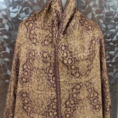 "🔷Vibrant Brown color 100% semi pashmina beautiful \"Jamavar\" Shawl/stole 80\"×28\" is fully fully embroidered by our talented and young artist. Jamavar means which is full covered/fill with embroidery. This shawl/shawl is embroidered by Golden color thread to make shawl/stole more attractive and beautiful.And the thread of this embroidery is silk thread. 🔷The Product is made of combination of wool and Pure Pashmina. 🔷The shawl/stole have beautiful handmade fringes too in the two end. 🔷This Semi-stitched Embroidered Pashmina Shawl, Embroidered Pashmina Shawl In Traditional Drape, Jamawar Shawl With Embroidered Border, Traditional Jamawar Pashmina Shawl With Embroidered Border, Embroidered Silk Pashmina Shawl, Traditional Drape Brown Raw Silk Dupatta, Traditional Chikankari Embroidery Pashmina Shawl For Eid, Traditional Brown Dupatta With Resham Embroidery, Chikankari Embroidery Pashmina Shawl For Eid