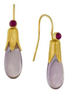 A design that evokes elegant simplicity. These amethyst teardrops fall from leafy filigree settings with hoops accented by a garnet. 24k gold vermeil. Size: 1 1/8" Elegant Amethyst Teardrop Earrings, Egyptian Motifs, Horse Sweater, Lapis Earrings, Gold Handbags, Jane Eyre, Laurel Burch, Garnet Earrings, Rhodolite Garnet