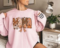 Mom Fall Sweatshirt,Personalized Mama Fall Sweater With Kids Name, Mama Pumpkin Hoodie, Fall Mama Coquette Pumpkin Sweater,Coquette Fall Mom Don't hesitate to contact us if you have any questions about colors, sizes, and personalization's.  *Our processing time is 1-2 business days and we're located in Texas, US. *We use high quality DTF Printing to print the designs on an iron-on vinyl. To Order: Select a size, color, and add personalization (if applicable) before adding to your cart.  How to T Cute Fall Hoodie Sweater, Cute Hoodie Sweatshirt For Fall, Cute Fall Hoodie Sweatshirt, Cute Fleece Tops For Fall, Cute Fall Hoodie, Cute Cozy Fit Long Sleeve Sweatshirt, Cute Hoodie For Fall Loungewear, Cute Fall Hoodie For Loungewear, Cute Fleece Sweater For Fall