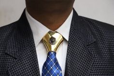 do you want o show your excitement ? luxurious gold plating tie knot Cover-Lion Face Gold Plated Tie Knot Cover - Statement Men's Accessory-statement piece for men's attire Trims: Brown Lead Free Chrome Plated Silver Handmade Product Vintage Product Product Finish : 925 Sterling Silver Product Material:   925 Sterling Silver Product Trims: Golden Lead Free Chrome Plated Silver Product Dimensions : 54.67 MM (Length) Product Dimensions : 55.08 MM (Width ) Product Origin : Made In India Product Sha Luxury Gold Tie For Formal Occasions, Luxury Gold Tie For Black Tie Events, Luxury Gold Suit And Tie Accessories For Formal Occasion, Visa Debit Card, Personalized Tie, Silver Tie, Mens Attire, Lion Face, Face Design