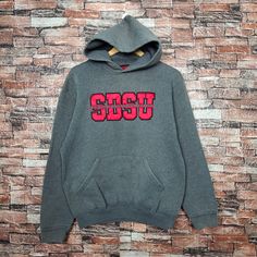 Vintage Distressed San Diego State University Sweatshirt San Diego Hoodie San Diego Pullover Embroidery Logo Gray Color Men's M Label : Black Label Collection Size : M(refer the measurement) Made In USA Materials from 50% Cotton 50% Polyester Used Item With Condition 5/10 Refer Picture. Distressed - Stain and Holes. Lay Down Flat Measurement : - Width (armpit to armpit) and: 22 Inches - Length (shoulder to end of garment): 25 Inches We are selling used clothing with good condition. DO NOT EXPECT the item is like new condition. Shipping: DHL/FEDEX EXPRESS with TRACKING NUMBER. Track and Trace http://www.dhl.com http://www.fedex.com Parcel will be arrive within 3-6 business days or more due to location and custom clearing. Please PROVIDE your PHONE/CONTACT NUMBER for SHIPPING/DELIVERY purpos Embroidered Sweatshirt For Streetwear In Winter, Embroidered Sweatshirt For Winter Streetwear, Casual Winter Sweater With Letter Embroidery, Sports Long Sleeve Hoodie With Embroidery, Gray Sweater With Embroidered Logo For Streetwear, College Hooded Sweater With Ribbed Cuffs, Streetwear Long Sleeve Hoodie With Letter Embroidery, Embroidered Logo Sweatshirt For College In Winter, Embroidered Red Hoodie For Streetwear