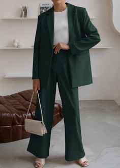 This Sophisticated Working Woman Blazer & Pants Suit Set is crafted from premium fabrics and attention to detail. The slim-fit blazer and tailored trousers are designed for both comfort and style, making it perfect for the working woman. The custom-made lining and secret pocket make it a practical choice for business meetings. Look professional and stylish with this must-have suit set. 95% Polyester, 5% Elastane Care instructions Machine Wash Size Chart XS = Dress 0-2, Bust, 31"-32.5", Waist 23" Latest Trendy Suits Women, Women’s Pant Suit Outfit Formal, Office Suit Trousers In Suiting Fabric, Solid Color Fall Business Pantsuit, Solid Color Business Pantsuit For Fall, Solid Business Pantsuit For Fall, Business Pantsuit For Fall, Business Casual Straight Pantsuit With Welt Pockets, Business Casual Pantsuit With Welt Pockets