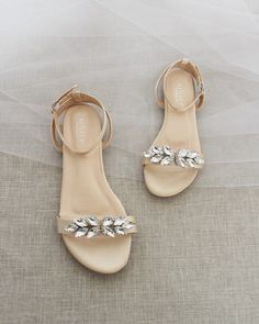 Classy satin flat sandals with butterfly brooch and ankle strap. Effortless yet adorable to wear on your favorite occassion. Can be pair with dress or casual look. DETAILS: COLORS AVAILABLE: Ivory, White, Pink, Light Blue, and Champagne UPPER: Synthetic upper and lining MATERIALS: Mandmade outsole Flat Summer Wedding Shoes For Bridesmaids, Summer Flat Heel Bridesmaid Wedding Shoes, Summer Wedding Shoes With Flat Heel For Bridesmaids, Summer Bridesmaid Wedding Shoes With Flat Heel, Flat Heel Wedding Shoes For Summer Prom, Summer Wedding Shoes With Flat Heel For Prom, Silver Sandals For Summer Wedding Guest, Gold Open Toe Sandals For Wedding Guest, Silver Sandals For Wedding Guest In Summer