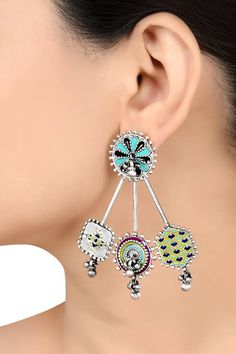 Oxidised silver plated earrings with multicolor enamel work, rawa work and ghungroo drops.
Type: Enamel
Composition:  Oxidised Silver
Color: Multi Color
Other Details: 
Dimensions L x W (in cms): 7.5 x 6
Weight (in gms): 38
Closure: Push back clasp
Note: The earrings are detachable and can be worn as studs as well
Disclaimer: The jewellery is handcrafted and therefore variations may occur - Aza Fashions Multicolor Cutdana Danglers For Celebration, Festive Multicolor Sterling Silver Earrings, Multicolor Cutdana Danglers For Navratri, Traditional Multicolor Sterling Silver Earrings, Fusion Style Multicolor Dangle Jhumkas, Fusion Style Multicolor Jhumkas For Festivals, Multicolor Fusion Dangle Jhumkas, White Fusion Danglers With Latkans, Multicolor Meenakari Dangle Jhumkas