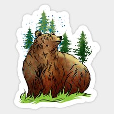 a brown bear sitting in the grass next to some trees