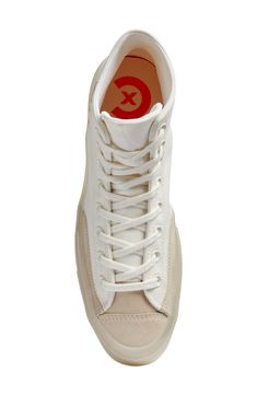 Translucent foxing tape traces the midsole of this suede-trimmed high-top sneaker, offering an elevated take on a closet-staple icon. Lace-up style Cushioned footbed with arch support Textile and leather upper/textile lining/rubber sole Imported High Top Sneaker, Converse Chuck Taylor All Star, Chuck Taylor All Star, Converse Chuck, Chuck Taylor, Up Styles, Arch Support, High Top, White Vintage