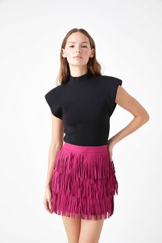 This Faux Suede Fringe Mini Skirt is the perfect way to add some fun and flair to any outfit. The mini skirt features a high waist for a flattering silhouette and a side zipper for a secure fit. The soft faux suede material feels like butter, and the fringe detail adds a playful and feminine touch. Whether you're dressing up for a night out or just looking to add some personality to your everyday style, this mini skirt is a great choice. Faux suede material Tiered fringe High waisted Mini length Fall Party Skort With Relaxed Fit, Fall Party Relaxed Skort, Relaxed Fit Skort For Fall Party, Relaxed Skort For Fall Party, Fall Mini Tiered Skirt For Night Out, Fall Tiered Mini Skirt For Night Out, Tiered Mini Skirt For Night Out In Fall, Fringe Mini Skirt, Suede Fringe Skirt