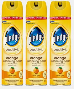 three bottles of deodorant are shown in this image, one is yellow and the other is orange