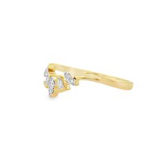 Add this regal 14k yellow gold crown ring from Gilded by G.St to your stack, showcasing baguette and round brilliant diamonds. • 14k yellow gold • 0.12tcw baguette & round brilliant diamonds • Band width: 4.5mm, band thickness: 1mm • In stock in size 6.5. Additional sizes are made to order