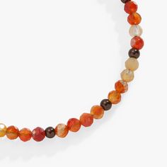 Accent your fall stack with this festival of fall-colored carnelian beads on a shiny expandable wire bangle bracelet. Expandable from 2" to 3.5" Finishes: Shiny Silver, Shiny Gold, Shiny Chocolate Nickel-free Adorned with genuine multi-color Carnelian gemstones; colors may vary due to natural makeup of the gemstones Adjustable Carnelian Beaded Bracelets With Gemstone Beads, Adjustable Carnelian Gemstone Beaded Bracelets, Adjustable Orange Agate Bracelet, Adjustable Orange Agate Bracelets, Adjustable Carnelian Beaded Bracelets, Adjustable Brown Carnelian Bracelets, Adjustable Carnelian Jewelry With Faceted Beads, Adjustable Orange Natural Stone Beaded Bracelets, Adjustable Orange Beaded Bracelets With Natural Stones